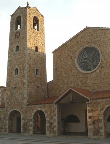 Arzachena - Il Campanile e la Chiesa Parrocchiale di San Giovanni Battista a Cannigione