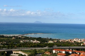 Sant’Agata di Militello, il porto in costruzione, sullo sfondo l’ Isola di  Alicudi