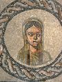 Aquileia - Basilica patriarcale - dettaglio busto di donna in mosaico.jpg