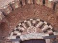 Casalvecchio Siculo - Iscrizione sul portale Basilica.jpg