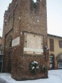 Certosa di Pavia - in memoria dei caduti - antico portale di Torre del Mangano.jpg