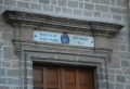 Manduria - Chiesa di San Michele Arcangelo - dettaglio iscrizione sul portale.jpg