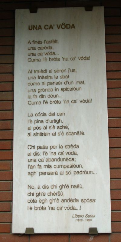 San Martino in Rio - Lapide Una cà vòda - poesia dialettate.jpg