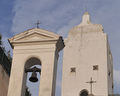 Trani - Chiesa S. Donato - Campanile a vela e Torre Orologio.jpg