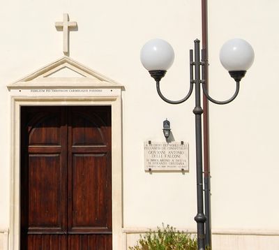 Pulsano - Chiesa dell'Arciconfraternita del Purgatorio - Iscrizione sul Portale laterale.jpg